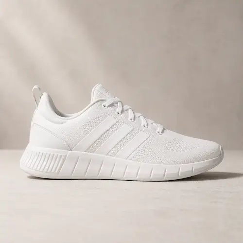 adidas Kaptir 3.0 style white sporty sneakers for men shown as casual shoes for walking, travel, and summer outfits