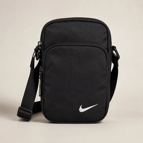 Nike Heritage-style black crossbody bag for men styled as a sporty streetwear sling bag