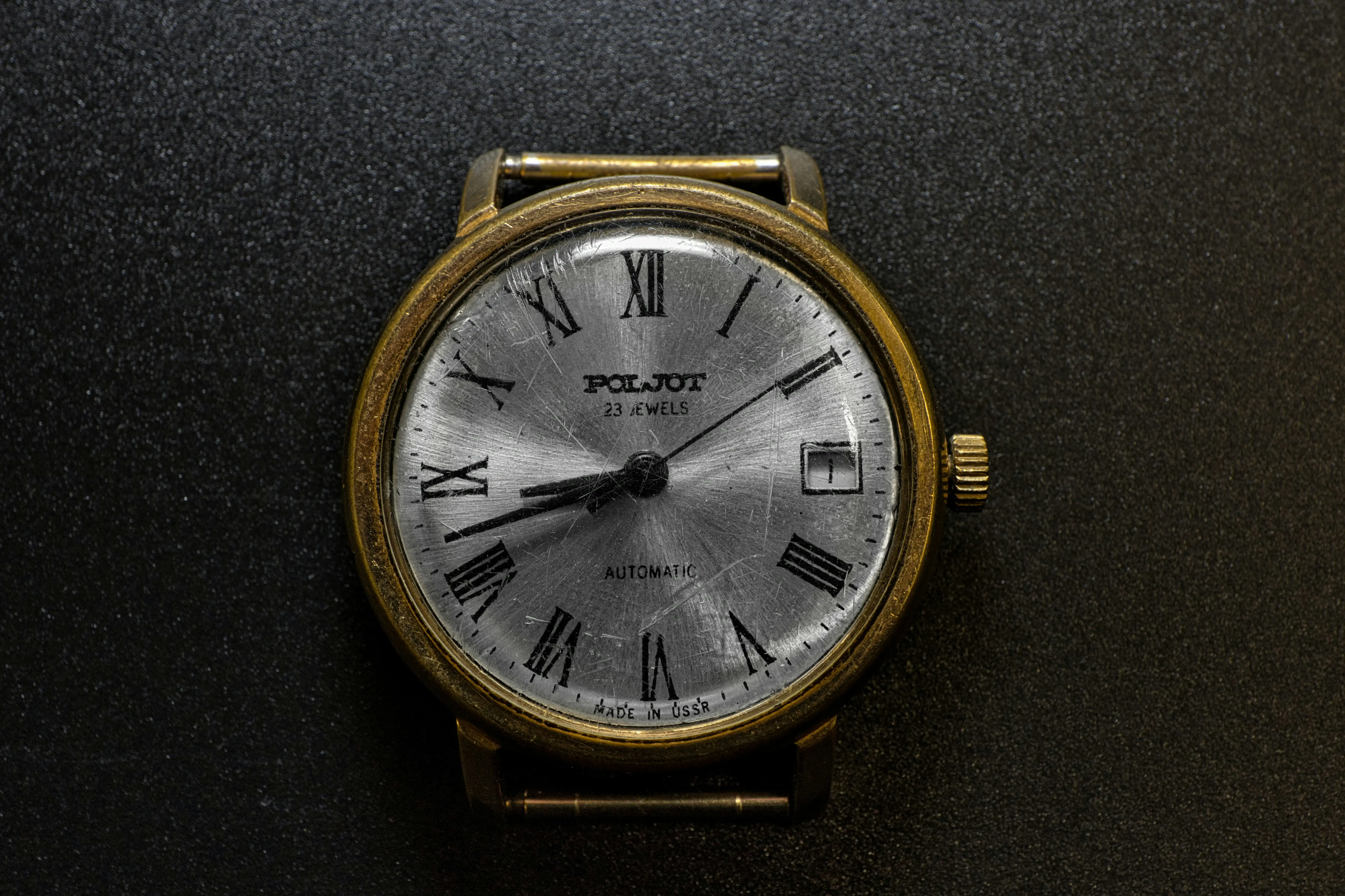 Men’s watches styled on a desk for an everyday Amazon watch guide